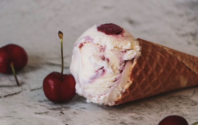  An ice cream cone filled with cherry ice cream that the owner of the brand created as part of a continuous effort to invest in the brand.